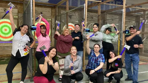 Group of friends axe throwing at FlagTagAZ in Flagstaff Arizona